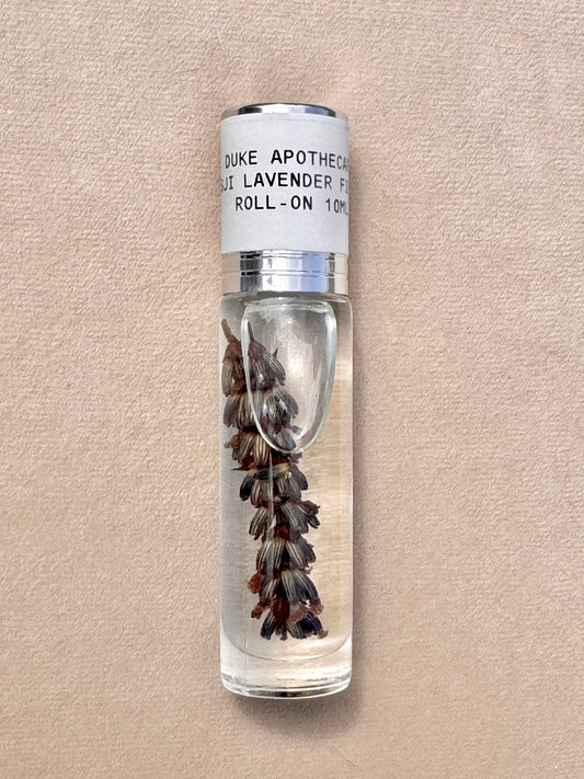 Duke Apothecary Lavender roll-on bottle on a beige background