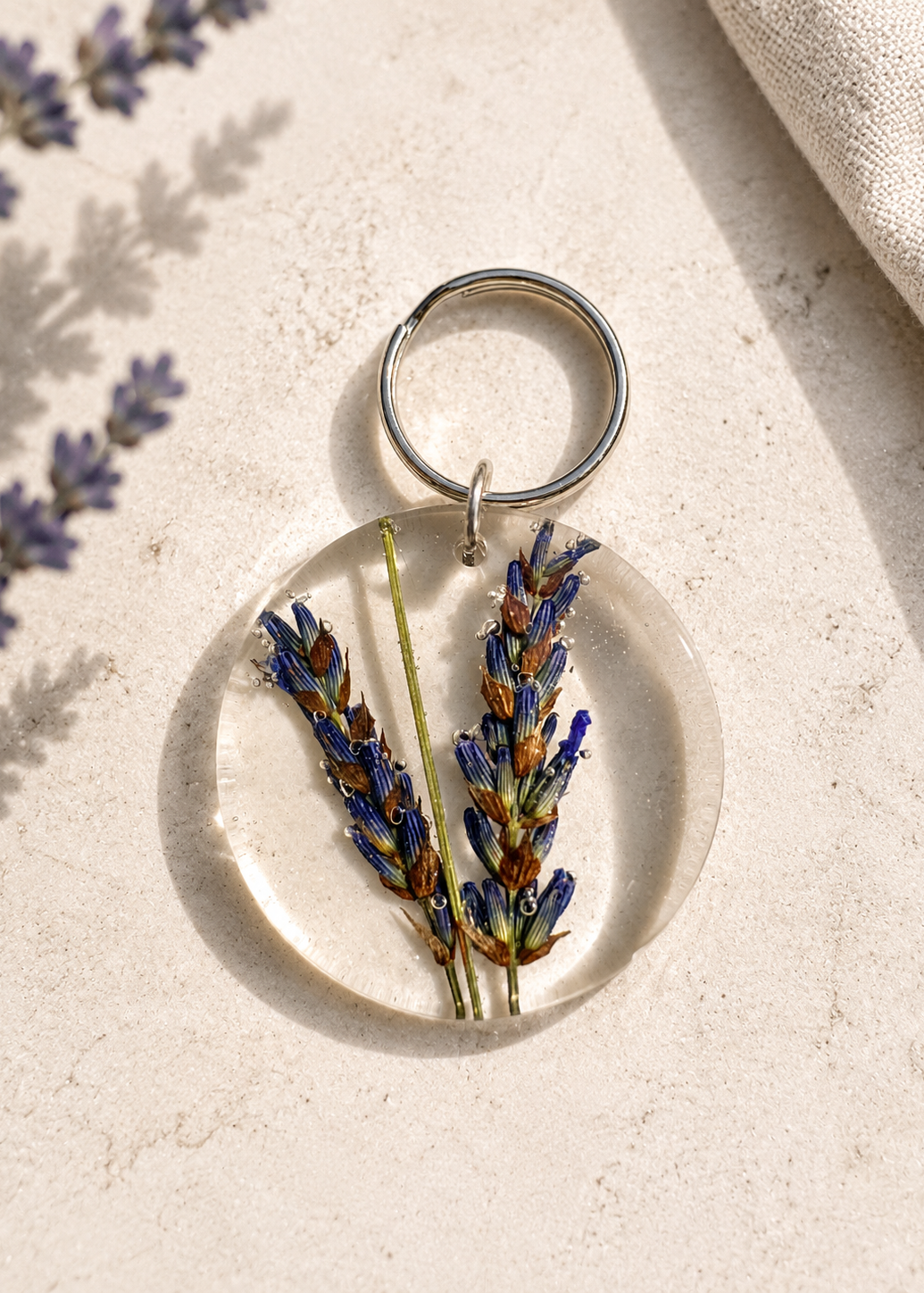 Keychain with lavender design on a light surface