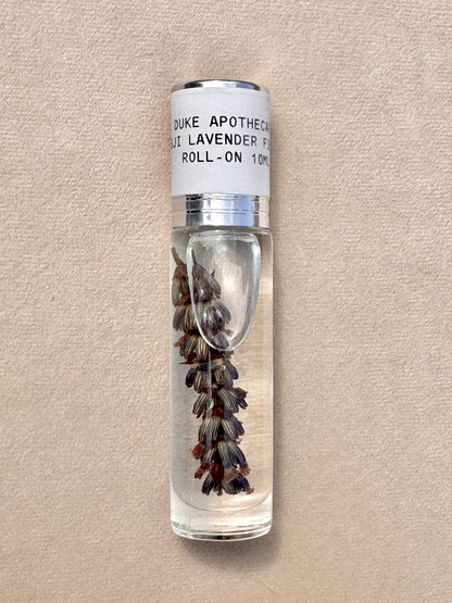 Duke Apothecary Lavender roll-on bottle on a beige background