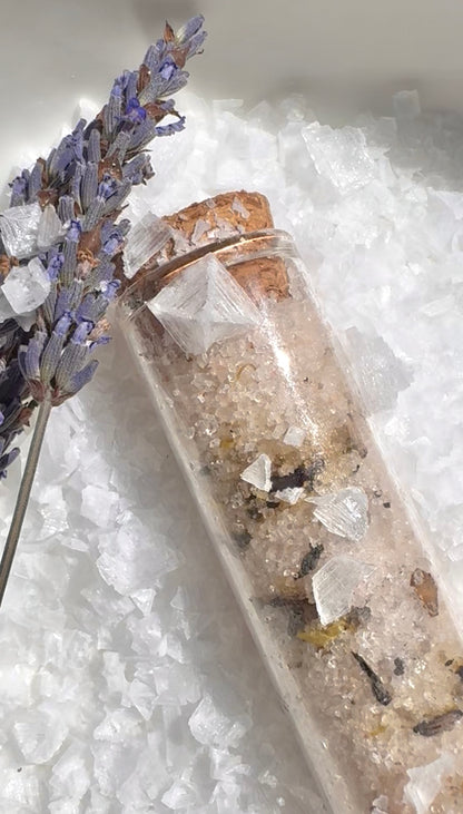 Salt Crystals with lavender flowers on a white background